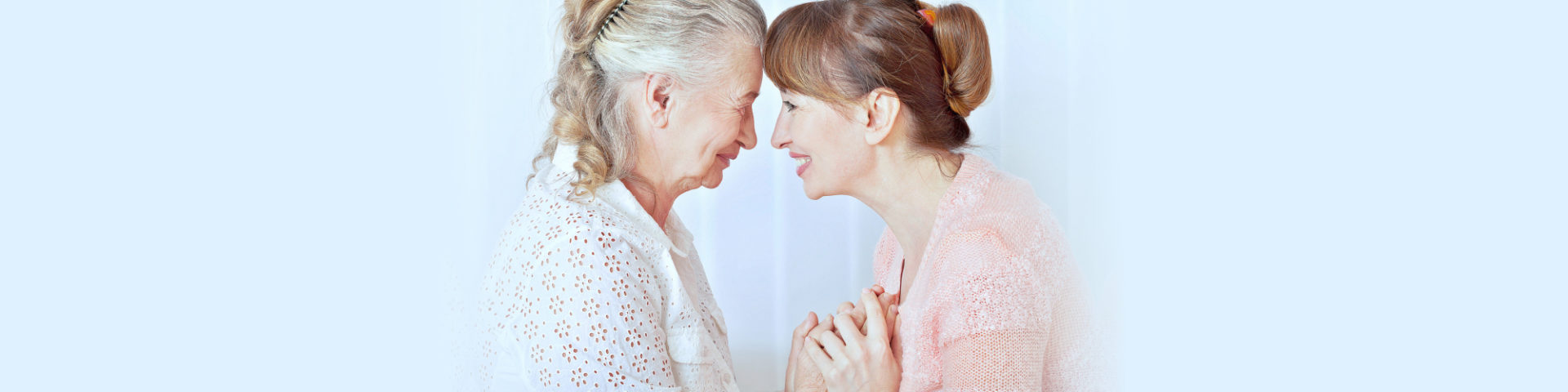 Seniors women with her caregiver at home